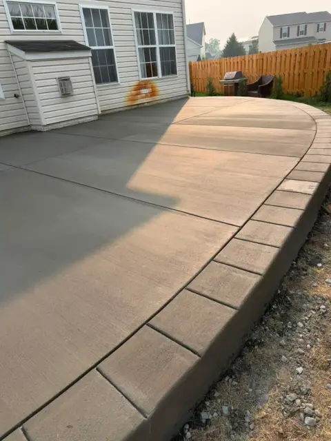 Concrete patio with decorative border